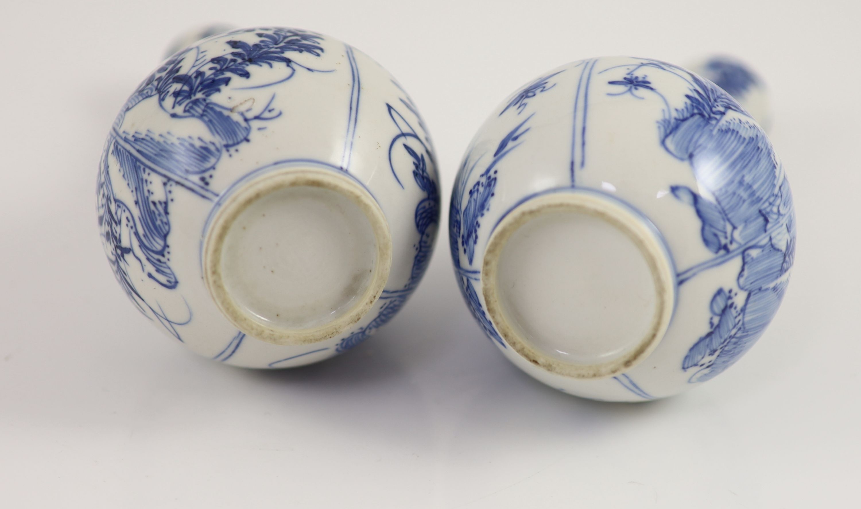 A pair of small Chinese blue and white garlic-neck vases, Kangxi period 13.5 cm high